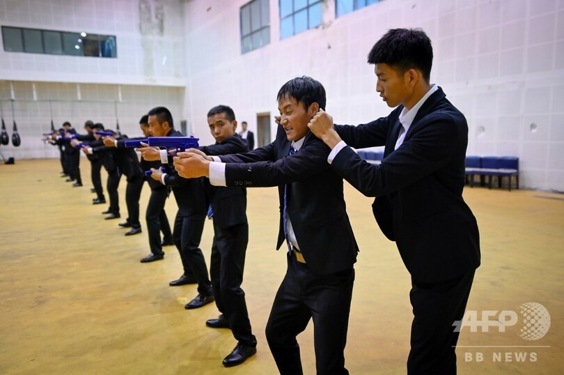 目指せ、中国新富裕層のボディーガード デジタル防衛は必須技能