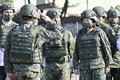 台湾・桃園の基地での予備役兵士の軍事訓練を視察する蔡英文総統（2022年3月12日撮影、資料写真）。(c)Sam Yeh / AFP