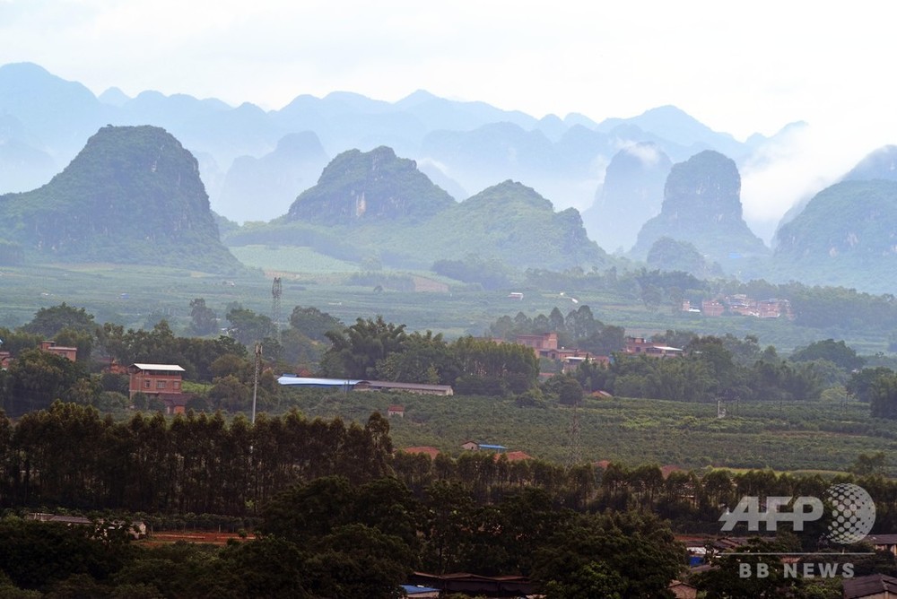雨後の郷村、山に雲がかかる 中国・広西 写真5枚 国際ニュース：AFPBB News