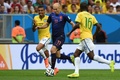 サッカーW杯ブラジル大会（2014 World Cup）3位決定戦、ブラジル対オランダ。ドリブル突破をはかるオランダのアリエン・ロッベン（Arjen Robben、中央、2014年7月12日撮影）。(c)AFP/VANDERLEI ALMEIDA