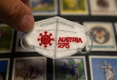 コロナ社会を象徴するマスク形の切手 オーストリア