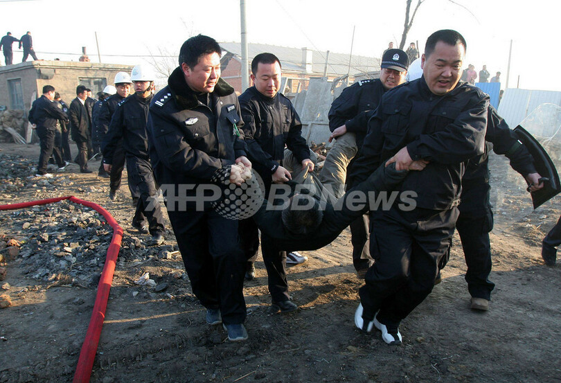 不動産ブームの中国内陸部、土地所有権めぐる問題