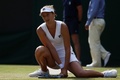 テニス、ウィンブルドン選手権、女子シングルス3回戦。ポイントを奪われ落胆するイリーナ・カメリア・ベグ（2015年7月3日撮影）。(c)AFP/JUSTIN TALLIS