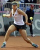 女子テニス、国別対抗戦フェドカップ、ワールドグループ1部準決勝、ロシア対ドイツ。リターンを狙うドイツのザビーネ・リシキ（2015年4月18日撮影）。(c)AFP/ALEXANDER NEMENOV