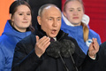 ロシア・モスクワの赤の広場で演説するウラジーミル・プーチン大統領（2024年3月18日撮影）。(c)NATALIA KOLESNIKOVA / POOL / AFP