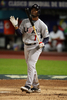 第2回ワールド・ベースボール・クラシック（%%2009 World Baseball Classic%%）2次ラウンド2組1位決定戦、ベネズエラ戦で三振に倒れ悔しがる米国のジミー・ロリンズ（%%Jimmy Rollins%%）。（2009年3月18日撮影）(c)AFP/Getty Images/Doug Benc