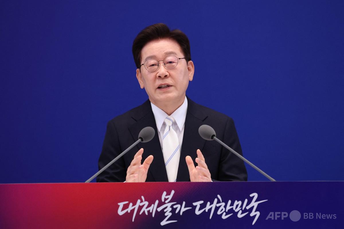 北朝鮮の非核化「諦めるべきではない」、韓国大統領 写真2枚 国際