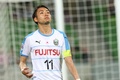 サッカーAFCチャンピオンズリーグ、グループステージ第4節、メルボルン・ビクトリー対川崎フロンターレ。失点して悔しがる川崎フロンターレの小林悠（2018年3月13日撮影）。(c)AFP PHOTO/CON CHRONIS