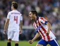 14-15スペイン1部リーグ第6節、アトレティコ・マドリード（Atletico de Madrid）対セビージャFC（Sevilla FC）。得点を挙げ歓喜するアトレティコ・マドリードのコケ（Jorge Resurreccion Merodio &apos;Koke&apos;、2014年9月27日撮影）。(c)AFP/DANI POZO