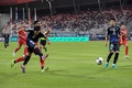 2026年サッカーW杯北中米大会アジア最終予選、グループC、バーレーン対日本。シュートを打つ南野拓実（2024年9月10日撮影）。(c)Mazen Mahdi / AFP