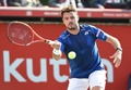 男子テニス、楽天ジャパンオープン、シングルス準々決勝。リターンを狙うスタン・ワウリンカ（2015年10月9日撮影）。(c)AFP/Toru YAMANAKA