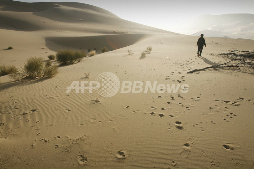 シルクロードで栄えた敦煌、砂漠に飲み込まれる危機に直面