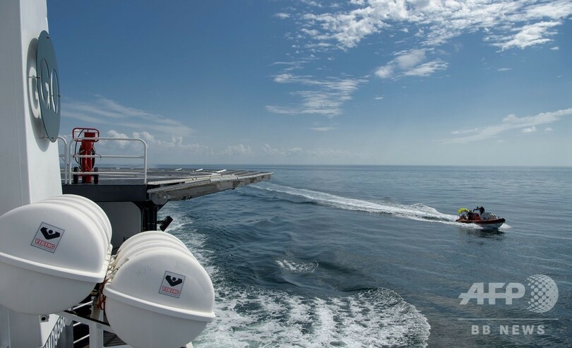 米有人宇宙船クルードラゴン、無事着水 地球に帰還