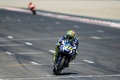 世界ロードレース選手権、第7戦スペインGPのMotoGPクラス決勝をトップでフィニッシュするモビスター・ヤマハのバレンティーノ・ロッシ（2016年6月5日撮影）。(c)AFP/JOSEP LAGO