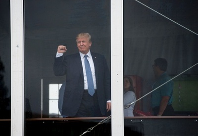 トランプ大統領が全米女子オープンに登場、温かい歓迎を受ける