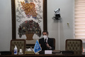 イラン首都テヘランで、アリアクバル・サレヒ原子力庁長官と会談を行う国際原子力機関（IAEA）のラファエル・グロッシ事務局長。イラン原子力庁提供（2021年2月21日公開）。(c)AFP PHOTO / HO / ATOMIC ENERGY ORGANIZATION OF IRAN