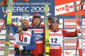ノルディックスキー世界選手権2009男子距離複合（３０キロメートル）、表彰式に臨む（左から）2位のアンデシュ・セデルグレン、優勝したペッテル・ノールトゥグ、3位のジョルジョ・ディチェンタ。（2009年2月22日撮影）(c)AFP/MICHAL CIZEK