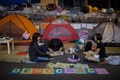 香港（Hong Kong）の金鐘（アドミラルティ、Admiralty）地区に集まったデモ参加者ら（2014年10月10日撮影）。(c)AFP/Ed Jones