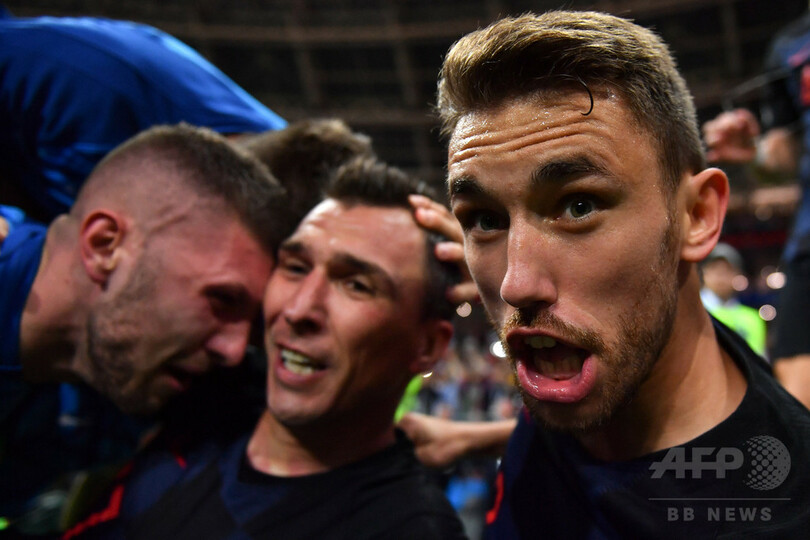 W杯でもみくちゃにされたAFPカメラマン、クロアチアに招待される