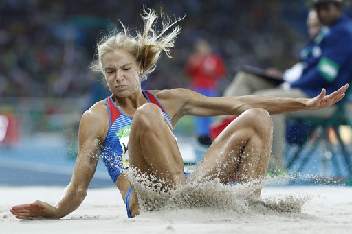 ロシア唯一の陸上選手、クリシナが女子走り幅跳びで決勝進出 写真7枚