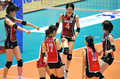女子バレーボール世界選手権1次リーグA組、日本対セルビア。勝利して喜ぶ日本の選手たち。（2010年11月3日撮影）(c)AFP/Katsumi Kasahara