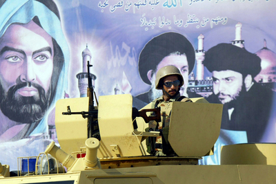 シーア派聖地の武力衝突の死者52人に、市内に外出禁止令