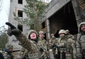 ウクライナの首都キエフ近郊で訓練に参加する軍の予備役（2022年2月19日撮影、資料写真）。(c)Sergei SUPINSKY / AFP