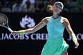 全豪オープンテニス、女子シングルス準々決勝。ポイントを失って悔しがるガルビネ・ムグルサ（2017年1月24日撮影）。(c)AFP/WILLIAM WEST