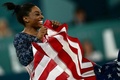 パリ五輪、体操女子団体決勝。優勝を喜ぶ米国のシモーネ・バイルス（2024年7月30日撮影）。(c)Loic VENANCE/ AFP