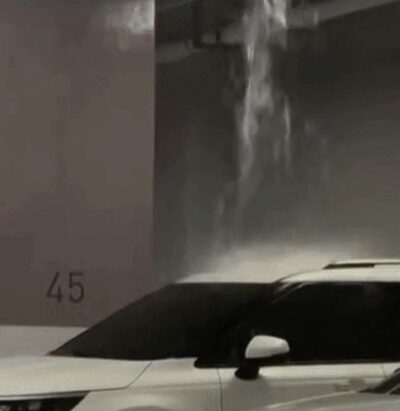 まるで洗車場…韓国・新築マンション地下駐車場・天井から滝のような水