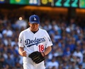 18MLB、ナ・リーグ西地区優勝決定戦、ロサンゼルス・ドジャース対コロラド・ロッキーズ。8回に三振を奪って喜ぶロサンゼルス・ドジャースの前田健太（2018年10月1日撮影）。(c)Jayne Kamin-Oncea/Getty Images/AFP