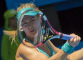 テニス男女混合国別対抗戦、第27回ホップマンカップ（Hopman Cup XXVII）初日、カナダ対チェコ。リターンを狙うユージェニー・ブシャール（Eugenie Bouchard、2015年1月4日撮影）。(c)AFP/TONY ASHBY