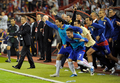 2010年サッカーW杯南アフリカ大会（%%2010 World Cup%%）欧州予選・グループ7、セルビア対ルーマニア。試合はセルビアが5-0で勝利し、本大会出場を決めた。写真は本大会出場を果たし歓喜するセルビアの選手。（2009年10月10日撮影）(c)AFP/ANDREJ ISAKOVIC