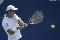 テニス、全米オープン（The US Open Tennis Championships 2014）男子シングルス1回戦。リターンを打つ錦織圭（Kei Nishikori、2014年8月26日撮影）。(c)AFP/Kena Betancur