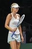 女子テニス、WTAツアー選手権（BNP Paribas WTA Championships - Singapore 2014）4日目。落胆した表情をみせるマリア・シャラポワ（Maria Sharapova、2014年10月23日撮影）。(c)AFP/ROSLAN RAHMAN