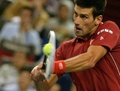 男子テニス、上海マスターズ（2014 Shanghai Rolex Masters）シングルス準決勝。リターンを狙うノバク・ジョコビッチ（Novak Djokovic、2014年10月11日撮影）。(c)AFP/GOH CHAI HIN