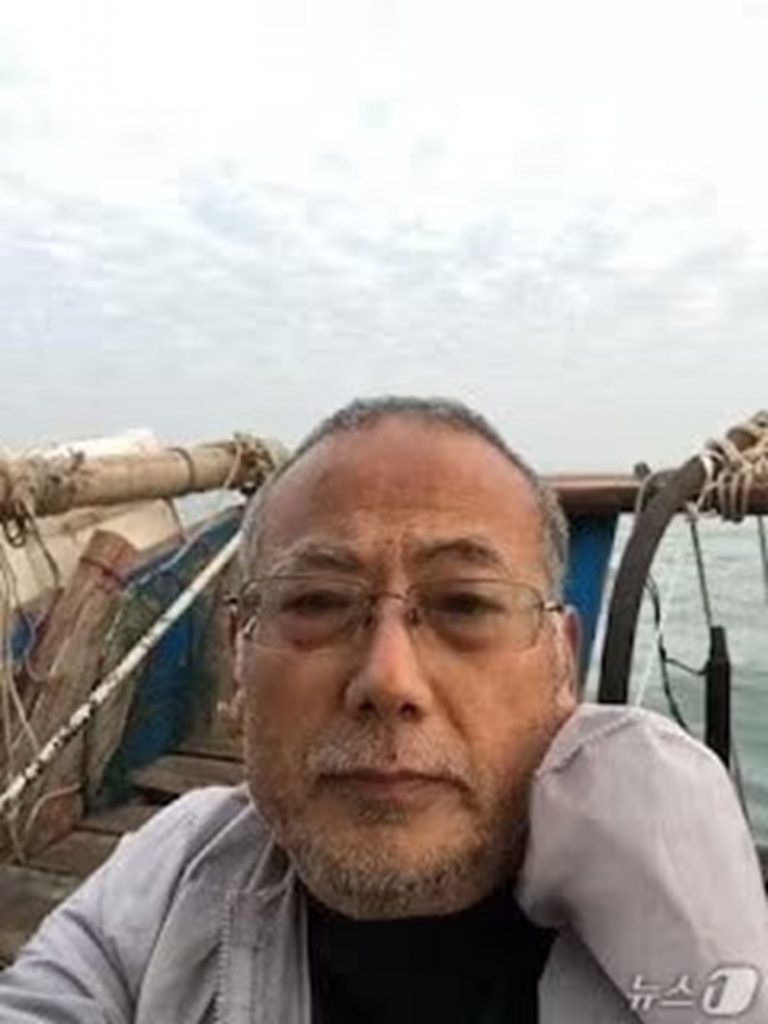海洋警察に摘発された中国反体制派の董広平氏(c)news1