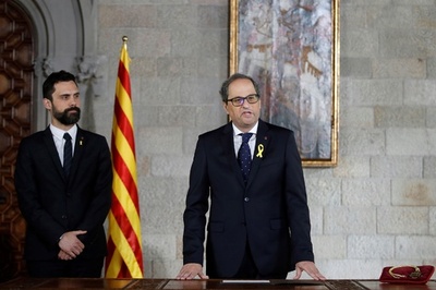 カタルーニャ自治州、新首相が就任宣誓 憲法順守に言及せず