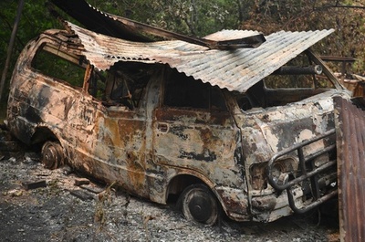 豪森林火災、観光客に足止めの恐れ 新たな熱波到来