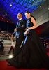 「第19回釜山国際映画祭（Busan International Film Festival、BIFF）｣のレッドカーペットに登場した俳優の渡辺謙（Ken Watanbe）さん（左）と韓国人女優のムン・ソリ（Moon So-Ri）さん（2014年10月2日撮影）。(c)AFP/JUNG YEON-JE