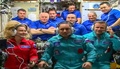 国際宇宙ステーション（ISS）に到着した（前列左から）ロシア女優のユリア・ペレシルドさん、アントン・シュカプレロフ宇宙飛行士、クリム・シペンコ監督。米航空宇宙局（NASA）が公開した映像より（2021年10月5日撮影・公開）。(c)AFP PHOTO / NASA 
