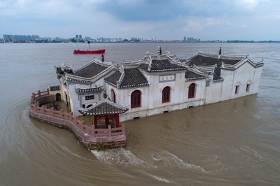 中国・湖南省で洪水や土砂崩れ相次ぐ、死者少なくとも63人