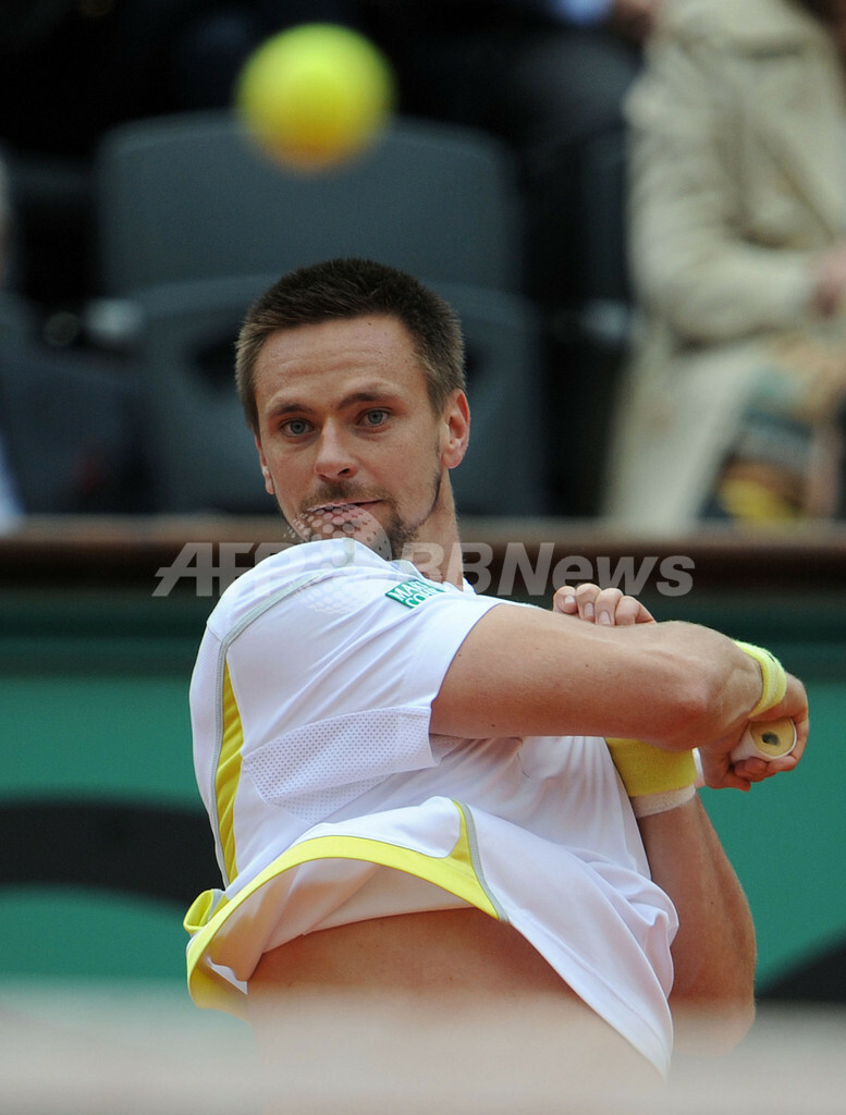 フェデラーが全仏オープン初優勝 、生涯グランドスラム達成 写真