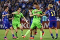 サッカーU-23アジアカップ決勝、日本対ウズベキスタン。PKを止めてチームメートと喜ぶ小久保玲央ブライアン（右から2人目、2024年5月3日撮影）。(c)KARIM JAAFAR / AFP