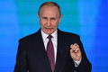 ロシアの首都モスクワのエキシビションセンターで年次教書演説を行うウラジーミル・プーチン大統領（2018年3月1日撮影、資料写真）。(c)AFP PHOTO / Yuri KADOBNOV 