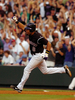 2回に本塁打を放ちダイヤモンドを回るロッキーズのヨルビト・トレアルバ（%%Yorvit Torrealba%%）。(c)AFP/Getty Images Steve Dykes