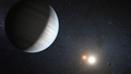 連星「ケプラー47（Kepler-47）」とその周囲を公転する2つの惑星の想像図（2012年8月29日提供）。(c)AFP/NASA/JPL CALTECH/T. PYLE