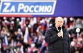 ロシア首都モスクワのルジニキ・スタジアムで開かれた集会で演説するウラジーミル・プーチン大統領（2022年3月18日撮影）。(c)Sergei GUNEYEV / POOL / AFP