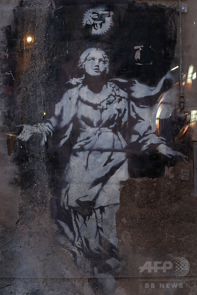 バンクシーの作品を守れ、壁画に透明パネル 伊ナポリ 写真3枚 国際