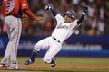 第3回ワールド・ベースボール・クラシック（2013 World Baseball Classic、WBC）は17日、米カリフォルニア（California）州サンフランシスコ（San Francisco）で準決勝が行われ、日本は1-3でプエルトリコに敗れた。

8回に安打を放ち、三塁ベースに滑り込む日本の鳥谷敬（Takashi Toritani、2013年3月17日撮影）。(c)AFP/Getty Images/Ezra Shaw